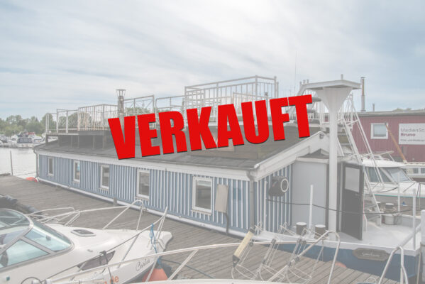 Aussenansicht des Hausboots EVA mit einer VERKAUFT Kennzeichnung.